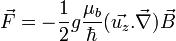 \vec{F} = -\frac{1}{2}g\frac{\mu _b}{\hbar}(\vec{u_z}.\vec{\nabla})\vec{B}